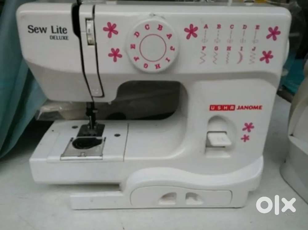 USHA Janome sewlite deluxe electric sewing machine.