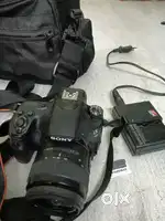 Sony Alpha 58 camera with charger,free 64 gb memory card,bag