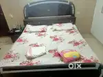 Double bed with side table