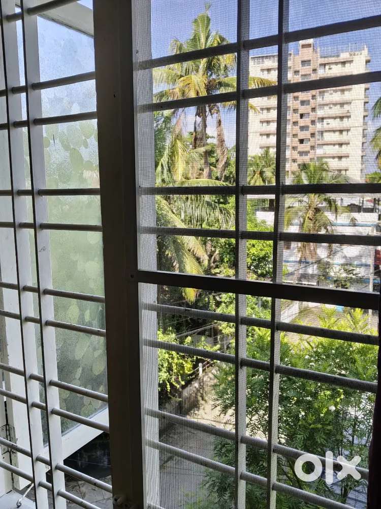 Furnished room with attached bathroom for male single occupancy.