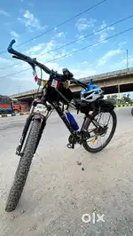 Firefox Maximus Mountain bicycle loaded with accessories for sale 15k