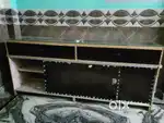 This is a wooden counter with a glass