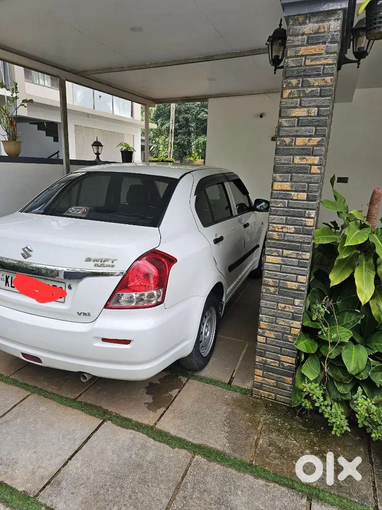 Well maintained 2012 model Dzire with long dicky space