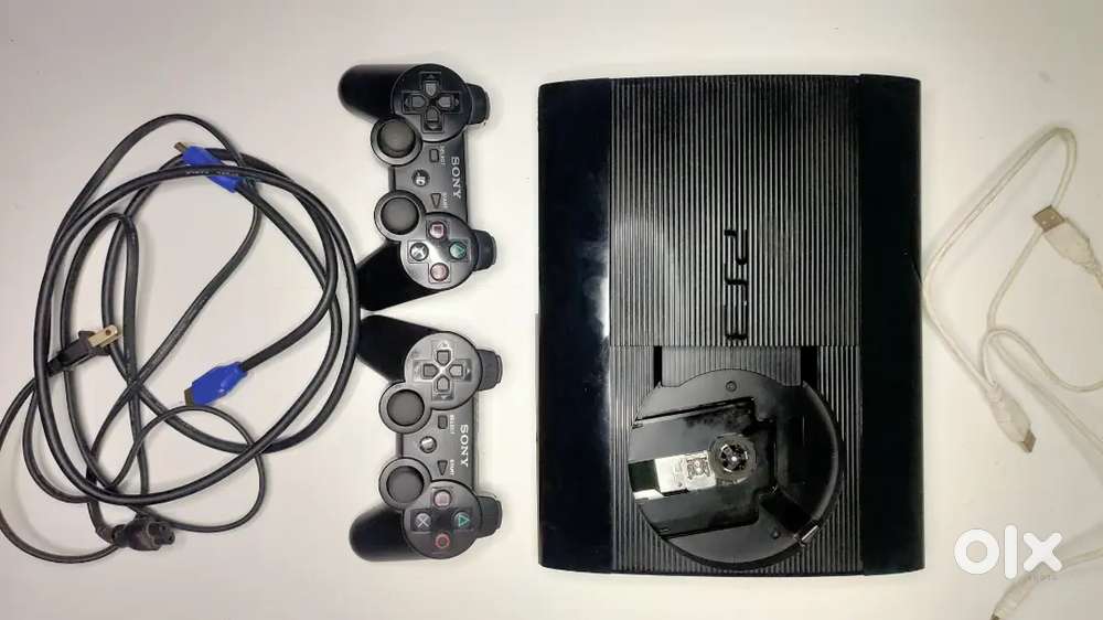 sony ps3 playstation 3 superslim 35+ games 2 remote and all wires
