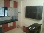 Near MAgarpatta South Gate 2 Bhk semi furnished  Flat For Rent.