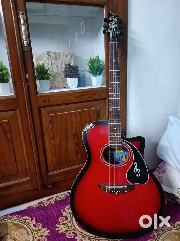 Yemaha natural Acoustic guitar, good condition urgent sell at  1700/-.