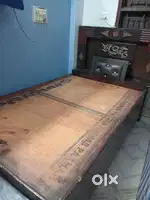 Single wooden designer bed