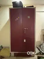 Iron almirah with 4 division storage 2 locker areas & negotiable price