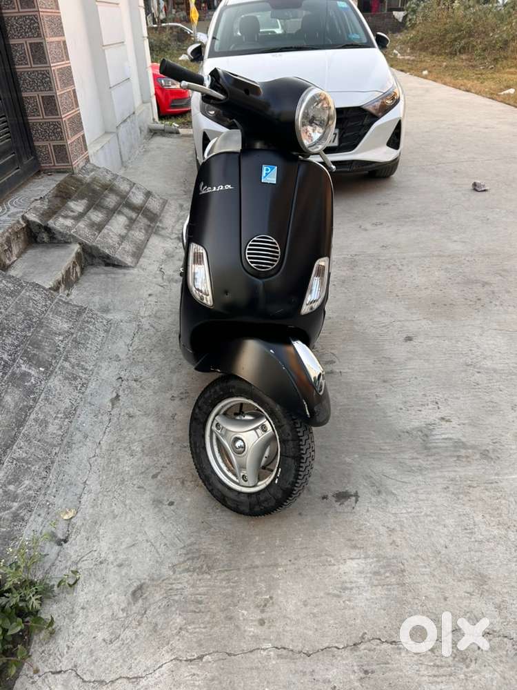 Vespa two wheeler matt black