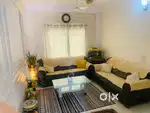 2 BHK spacious semi furnished flat with attached balcony. Negotiable.