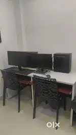 Computer with table and chair
