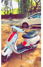 Pearl white Vespa VXL
