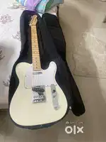 Fender electronic guitar with amplifier for sale