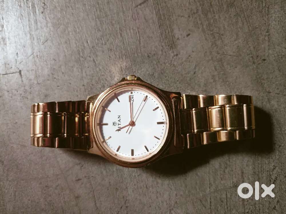 TITAN SONATA GOLDEN WATCH