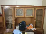 Wooden cupboard for crockery along with the computer table