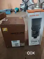 Nikon 50mm lens, Godox ttl520ii flash with accessories