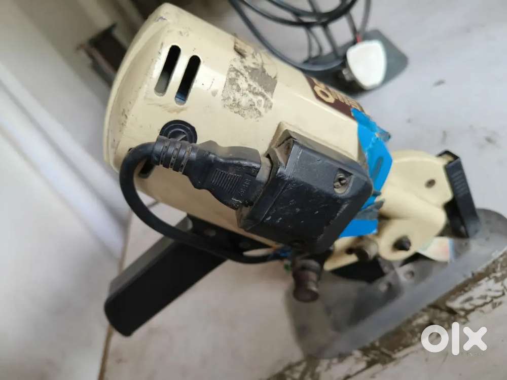 2 checking table for garment and 2 cutting machines