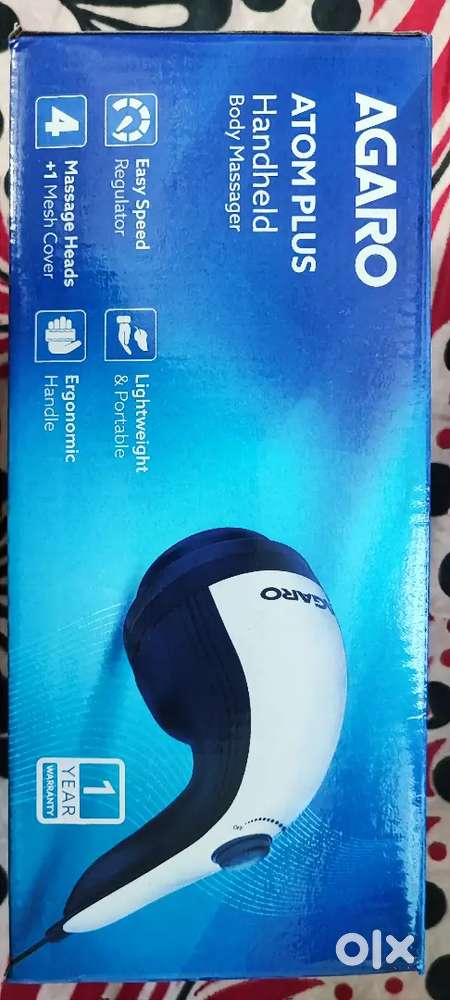 Hand held body massager