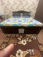 Box bed with cushion and storage support