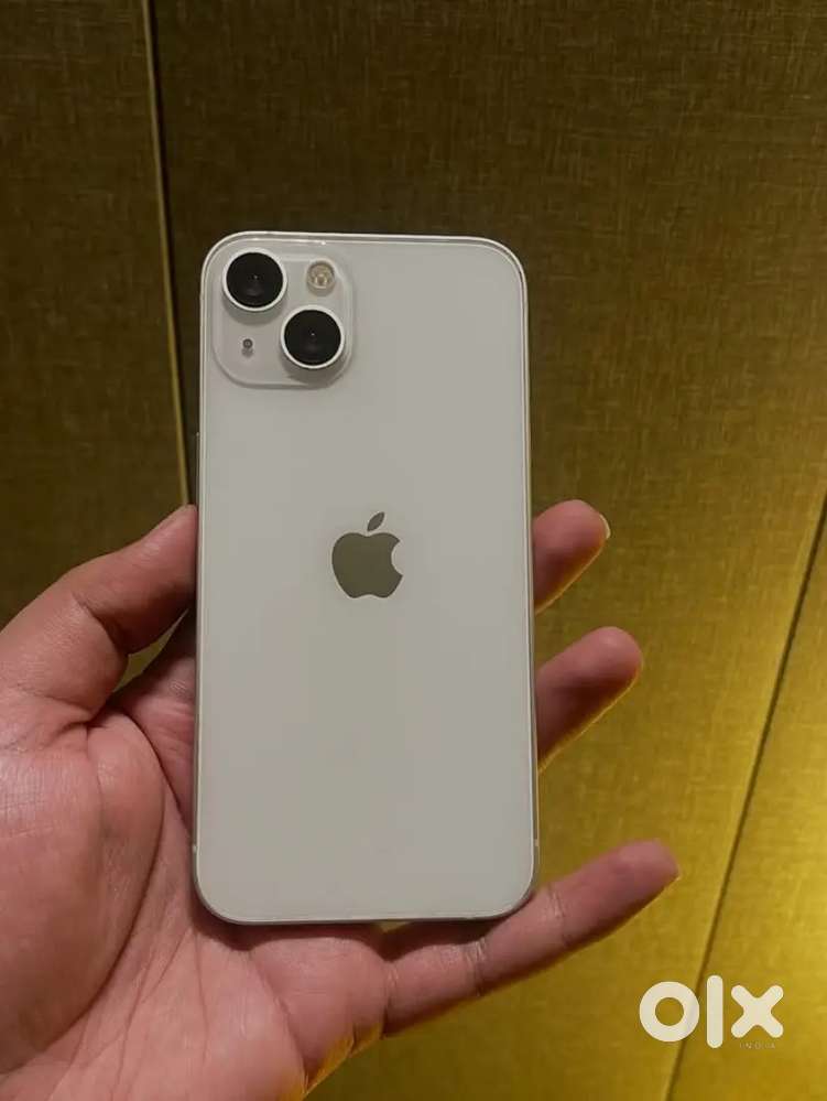 Selling my 4 months old I phone 13 in white colour Need urgent money