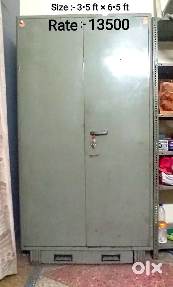 Godrej Iron Almirah and 2 steel racks in good condition,no timepass pl