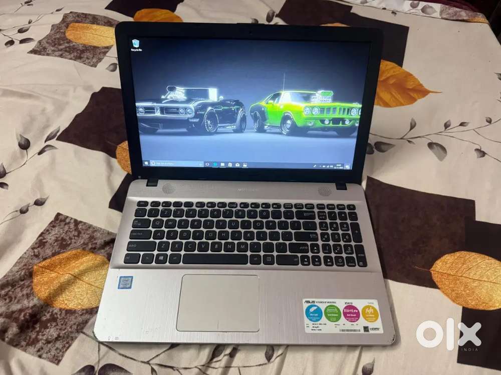 Asus Core i3 processor 2.4ghz 8gbram 1tbstorage Intel HD graphics 4hrs