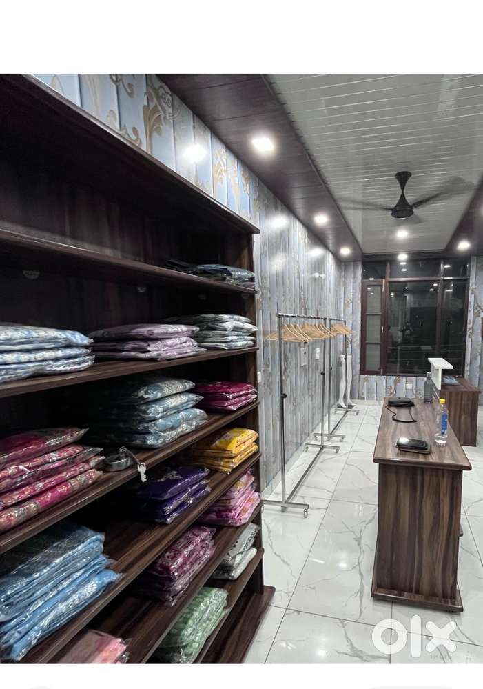 Shop Center table and cloth shelf