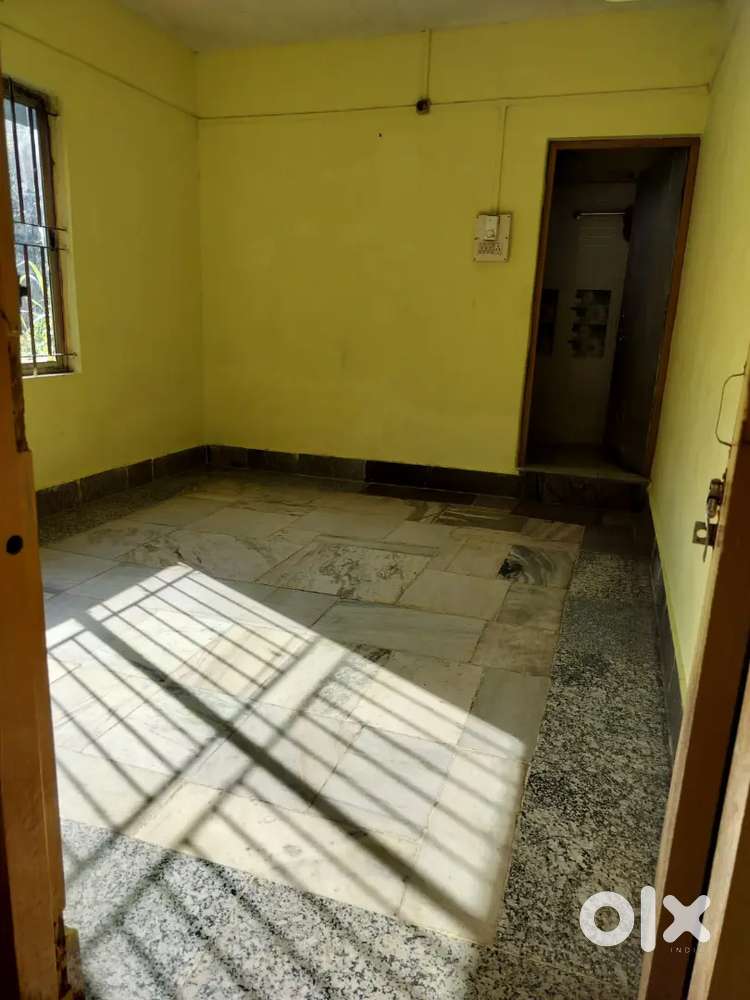 One room with attached bathroom and kitchen with running water