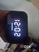 Digital clock with charging station