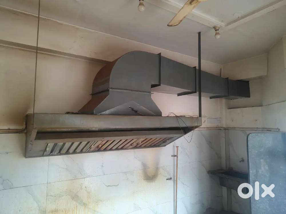 Commercial chimney with long hood.