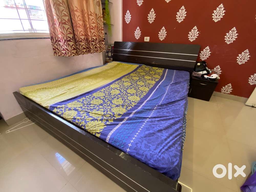 King-Size bed with mattress in good condition