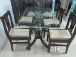 6-seater Dinning Table in wood with glass top at Palava City