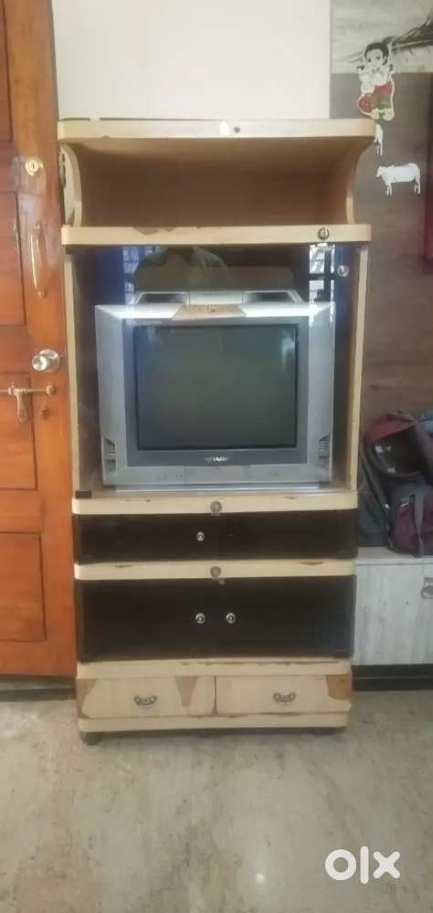 TV, TV stand and setup box
