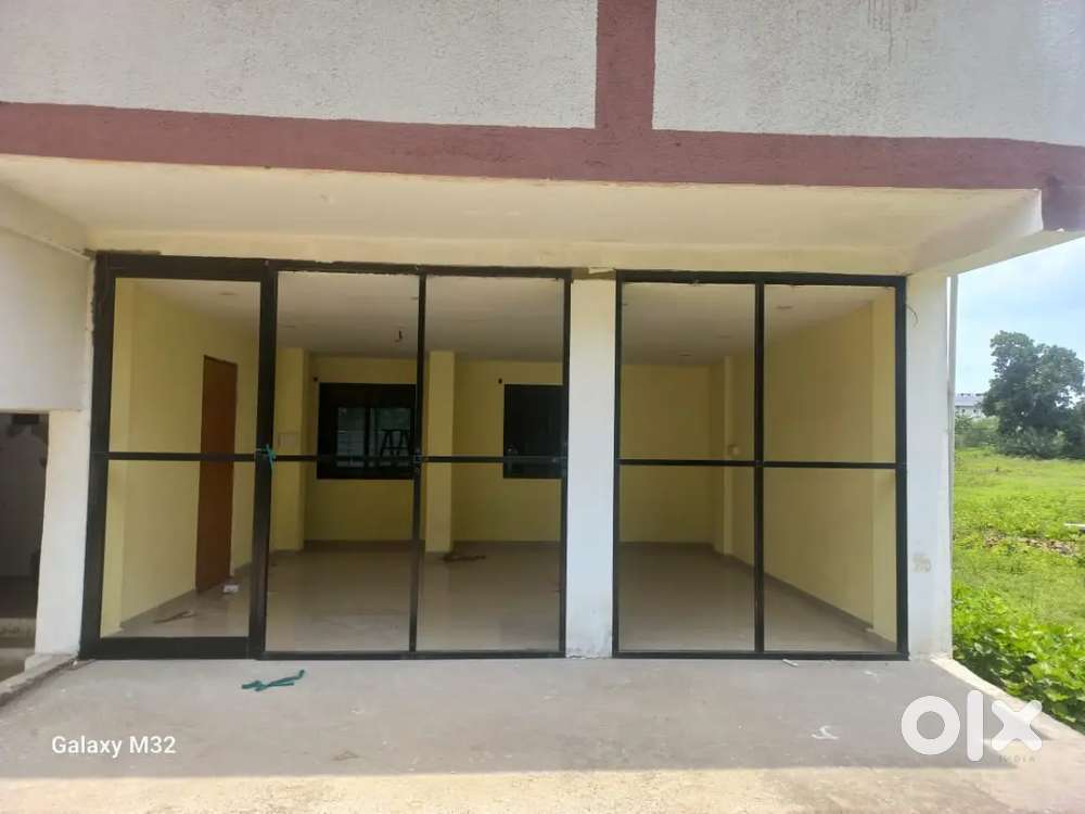 FLAT WITH ROAD FACING SHOP/ PLOT also for sale