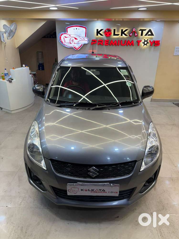 Maruti Suzuki Swift LXI Optional-O, 2017, Petrol
