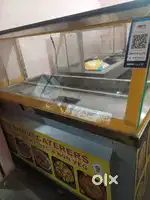 Curry counter2 ,water drums, cooking stove, chapati stove,cans, spunsh