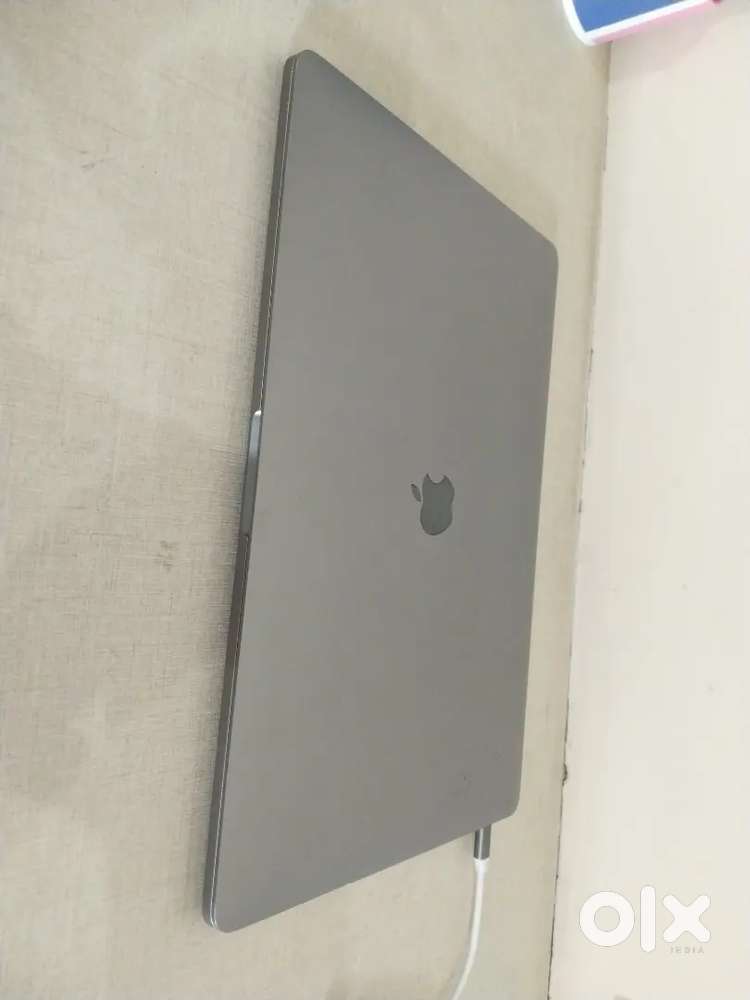 Apple MacBook Pro with touch bar & original charger