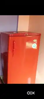 Godrej fridge with plastic stand