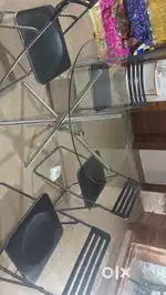 Glass round shape dining tabel with 4 solid chairs & 1 office chair
