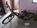 Hercules bicycle for kid  with orange frame Withgood running condition