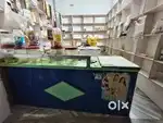 Shop counter racks and deep fridge for sale