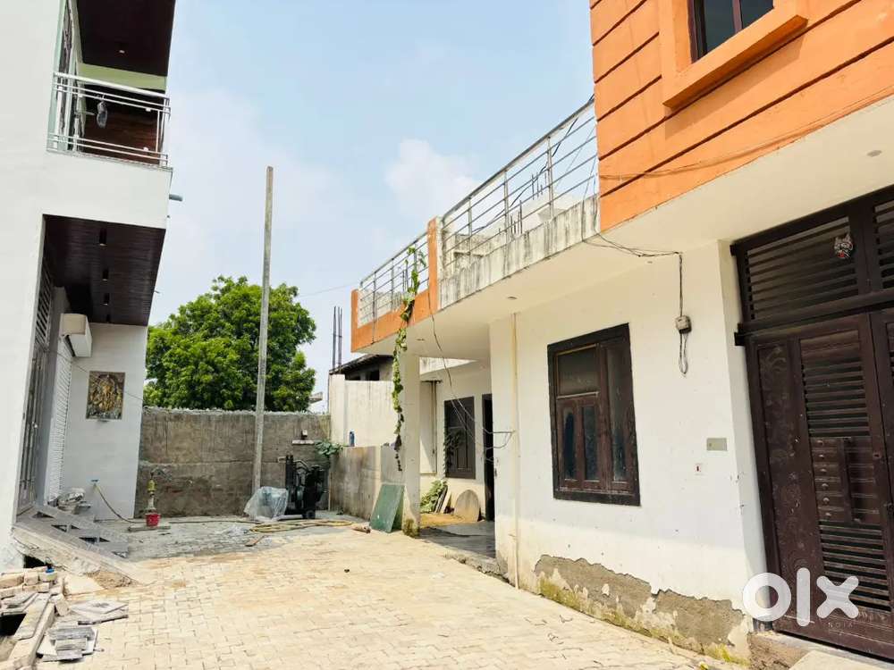 On road plot men road in Noida Extension 70 80% loan