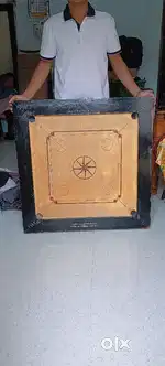 Big Size Carrom 32mm Full & best condition...with Coins and striker.