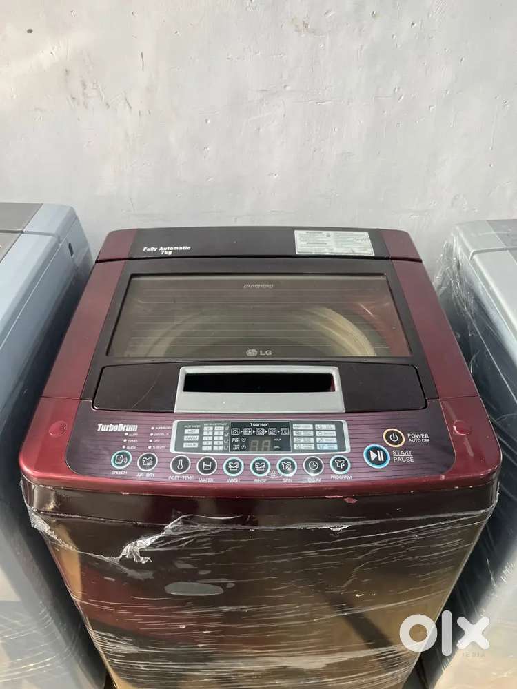 LG washing machine fully automatic top load with warranty 1 year old
