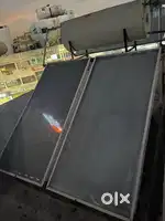 Solar water panel with tank