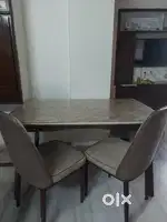A Dining table with 2 chairs