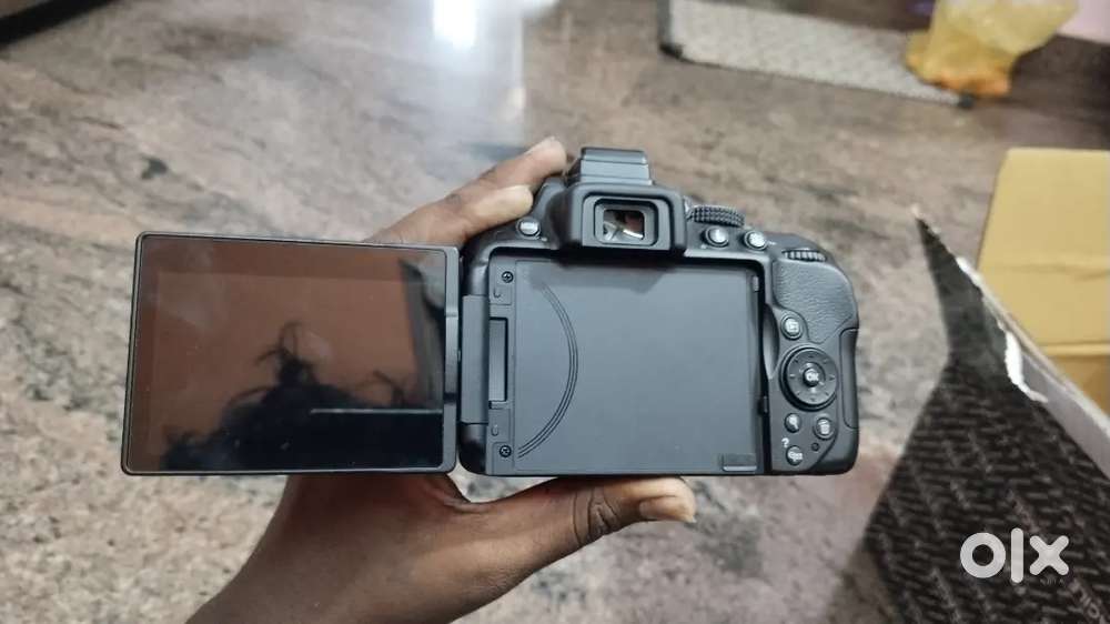 Body lens battery charger and sd card