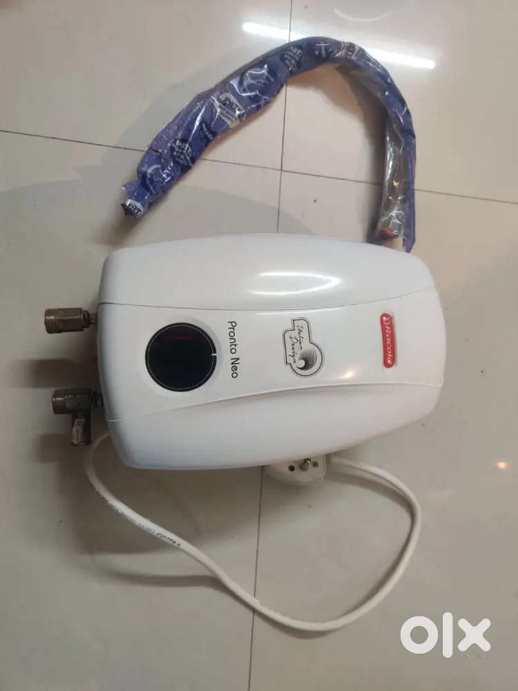 Racold Pronto Neo Geyser &  Food packaging Sealing Machine.