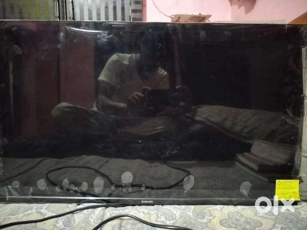 Mi smart TV 32 inch display sound ok sirf mathorboad kharab hai