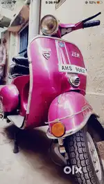 Priya vespa old scooter pink colour